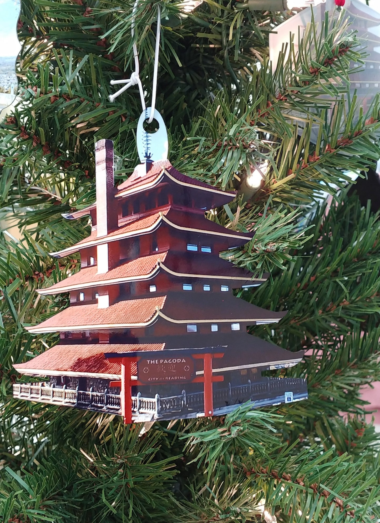 Adorno de pagoda de lectura